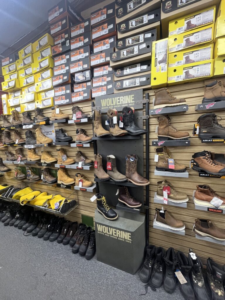 Wolverine work boots on store display wall
